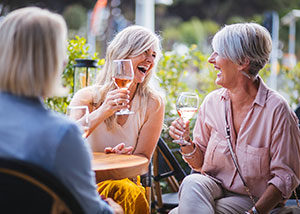 Women tasting wine