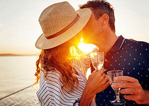 Couple Kissing during Romantic Sunset