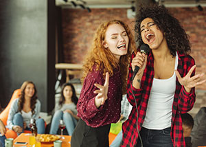 Women Singing Karaoke