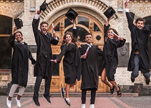 Graduates jumping - Graduation Quotes
