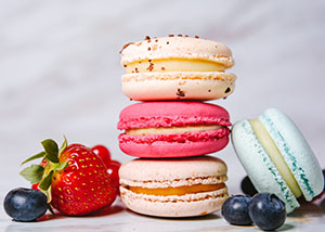 Stack of macarons with fresh fruit