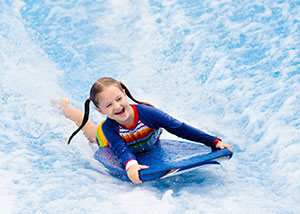Girl Playing at a Water Park 