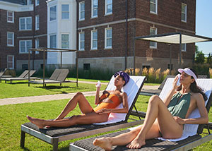 Women sunbathing at QC NY Spa