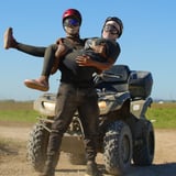 Couple in front of ATV
