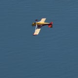 Plane flying over water