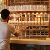 Man tapping beer