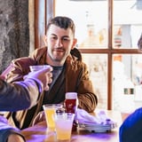 Man toasting beer