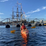 Person in kayak in harbor