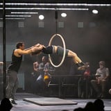 Entertainer jumping through hoop