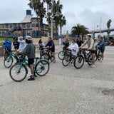 Group riding bikes on street