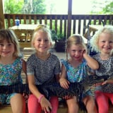 4 little girls holding gator