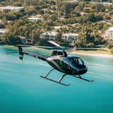 Helicopter over water