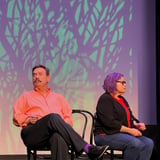 Two people sitting