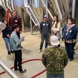Guide giving brewery tour