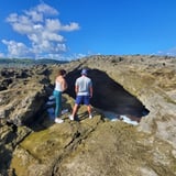 Couple Looking at Hole