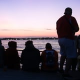 Group viewing sunset