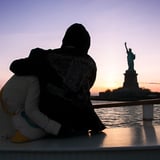 Couple viewing Statue of Liberty