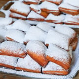 Lots of Beignets Covered in Powdered Sugar