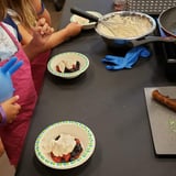 Kids making dessert