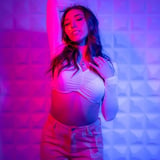 Girl Posing with Purple and Pink Lights