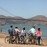 Group with bikes on beach