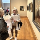 Tour guide showing art