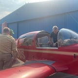 Passengers in Grumman AA-5