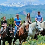 Group on Horses in Mountains