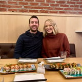 Two people enjoying sushi