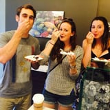 Three people enjoying food