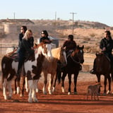 Group on horses in desert