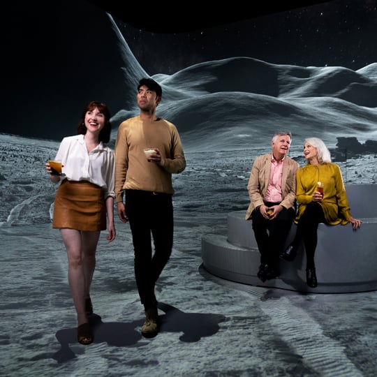 People with drinks on the moon