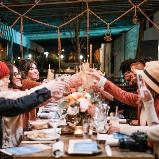 Group toasting drinks