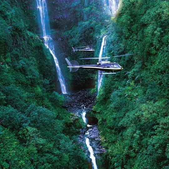 Helicopter over waterfalls in Hana