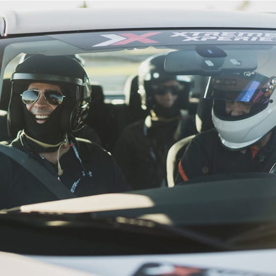 Gift Box Speed Thrills: Ride-Along with a Pro Race Car Driver