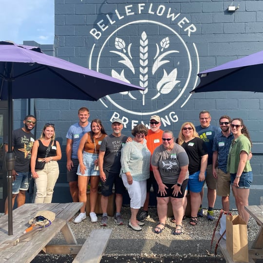 Group in front of brewery