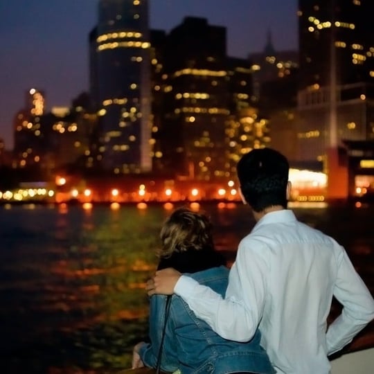 Couple viewing city at night