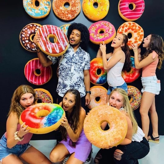 Group Posing with Doughnuts 