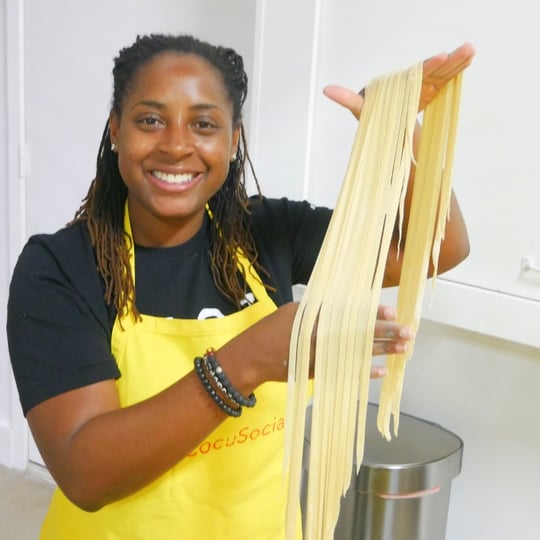 Woman holding pasta