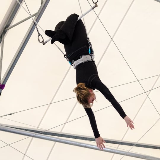 Woman on trapeze