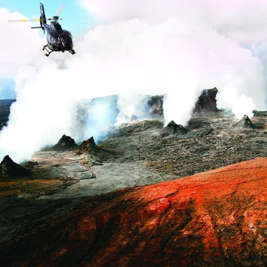 Helicopter above volcano