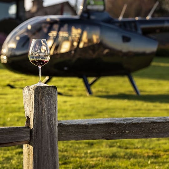 Helicopter and glass of wine