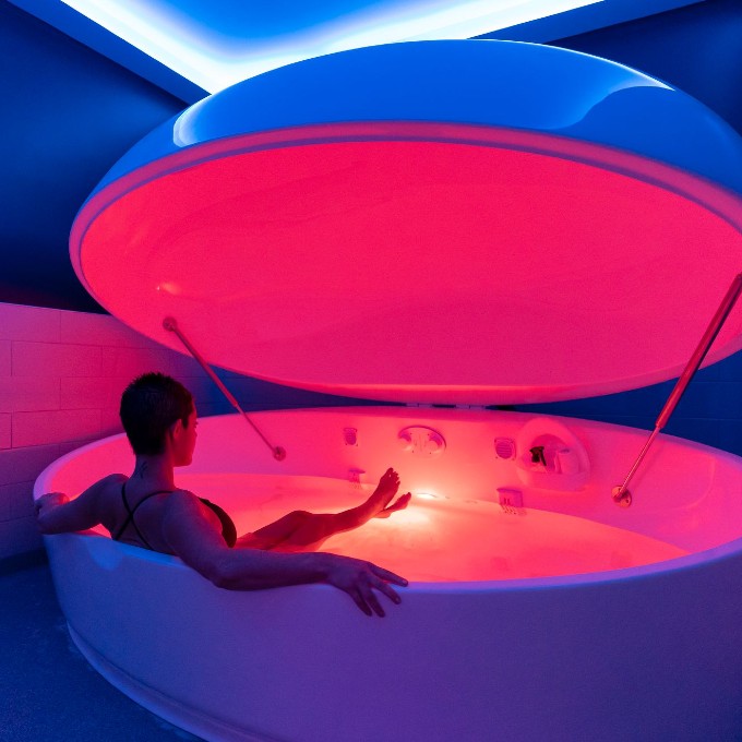 Woman sitting in float tank