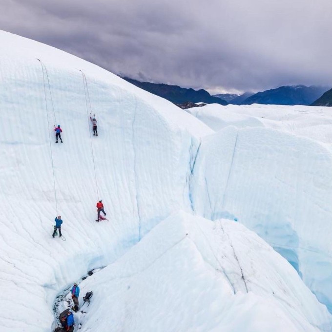 Group Climbing up Glacier