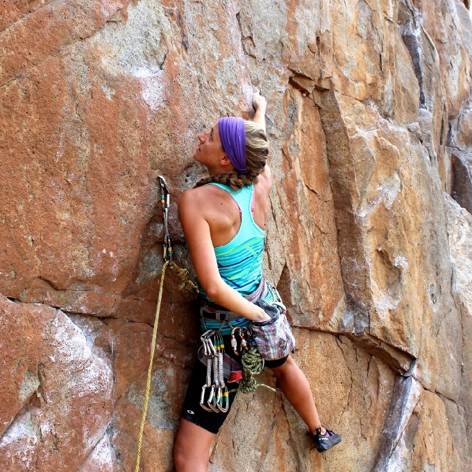 Person climbing rock