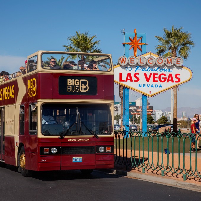 Bus in front of Las Vegas sign