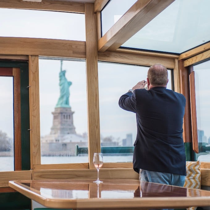 Person observing Statue of Liberty
