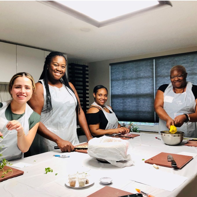 Group Posing While Cooking