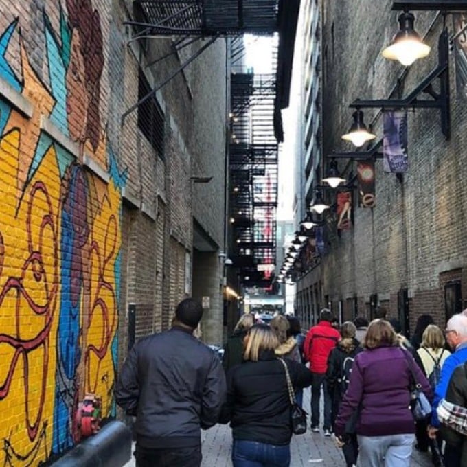 Group walking through alley