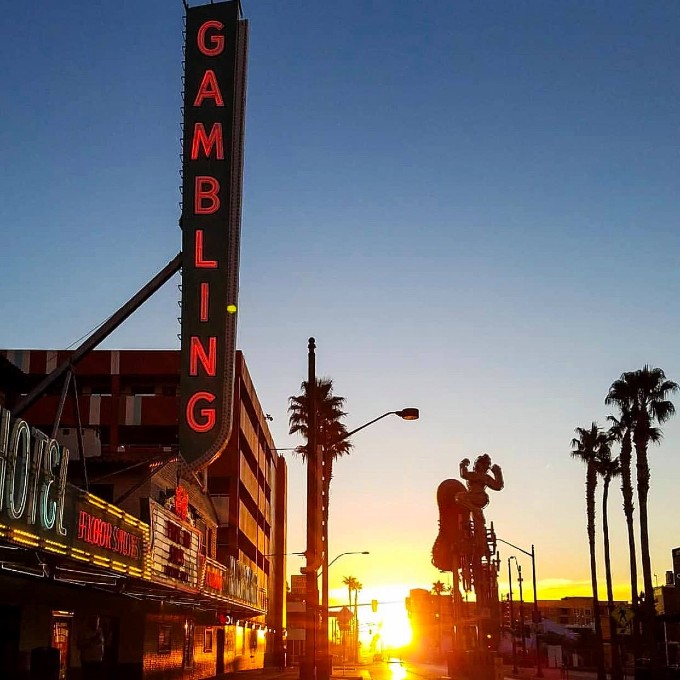 Gambling sign at sunset